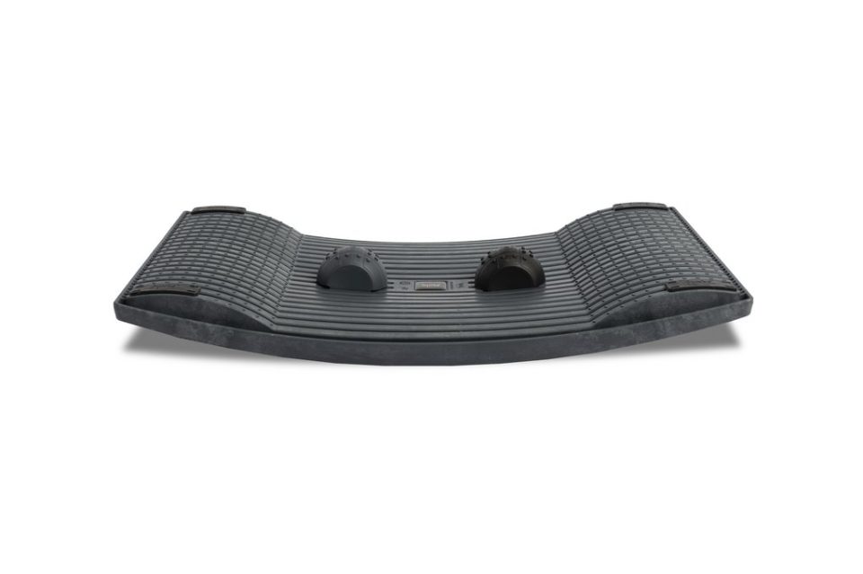 Gymba balance board shown from the front, featuring curved ergonomic base and raised balance domes for active standing at a desk.