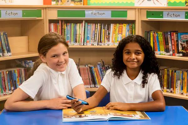 C-Pen Reader 3 in use by 2 school children in school setting