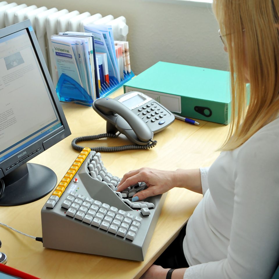 Maltron single handed keyboard right in use in an office environment