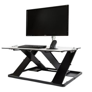 Opløft Sit-Stand Platform raised up with a monitor, keyboard and mouse present on the platform