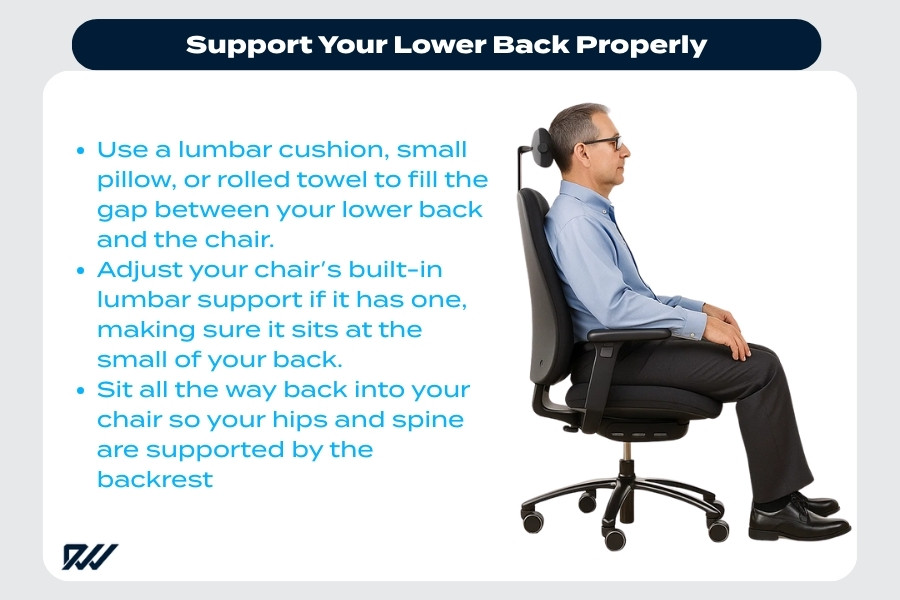 Man sitting in an office chair with lumbar support for the lower back.