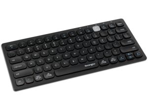Angled view of the Kensington compact dual wireless keyboard showing the slim, low-profile design and rounded keys.