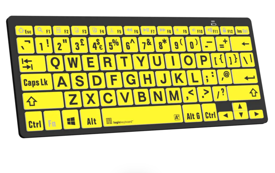 LogicKeyboard Black on Yellow keyboard shown at an angled perspective highlighting the slim design and high contrast keys.