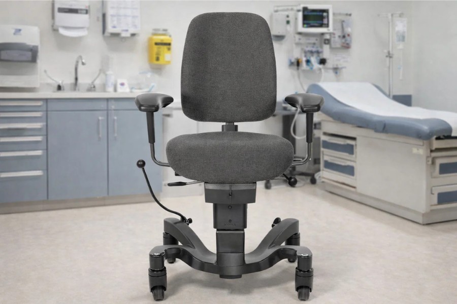 Specialist ergonomic chair with locking wheels used in a clinical healthcare environment