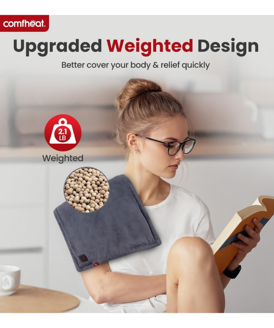Comfheat Rechargeable Heating Pad shown across a person's shoulder with graphic highlighting its upgraded 2.1 lb weighted design. 1