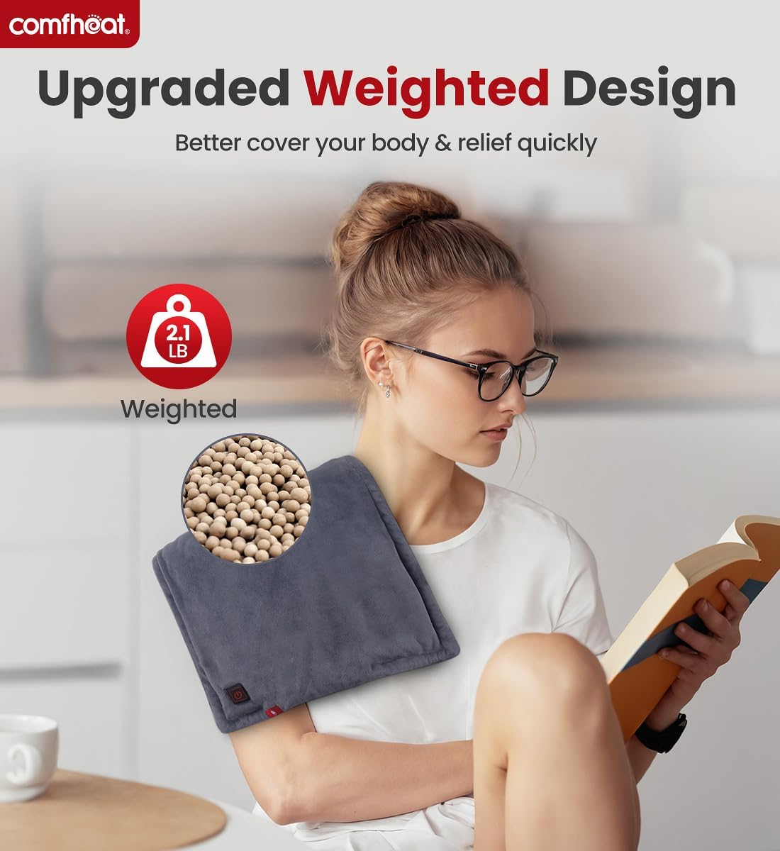 Comfheat Rechargeable Heating Pad shown across a person's shoulder with graphic highlighting its upgraded 2.1 lb weighted design.