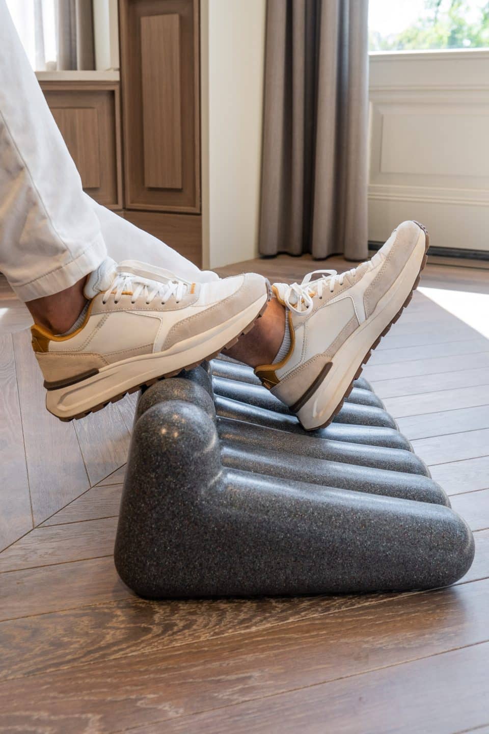 Person using the FootRest No.4 by BakkerElkhuizen from the opposite side.